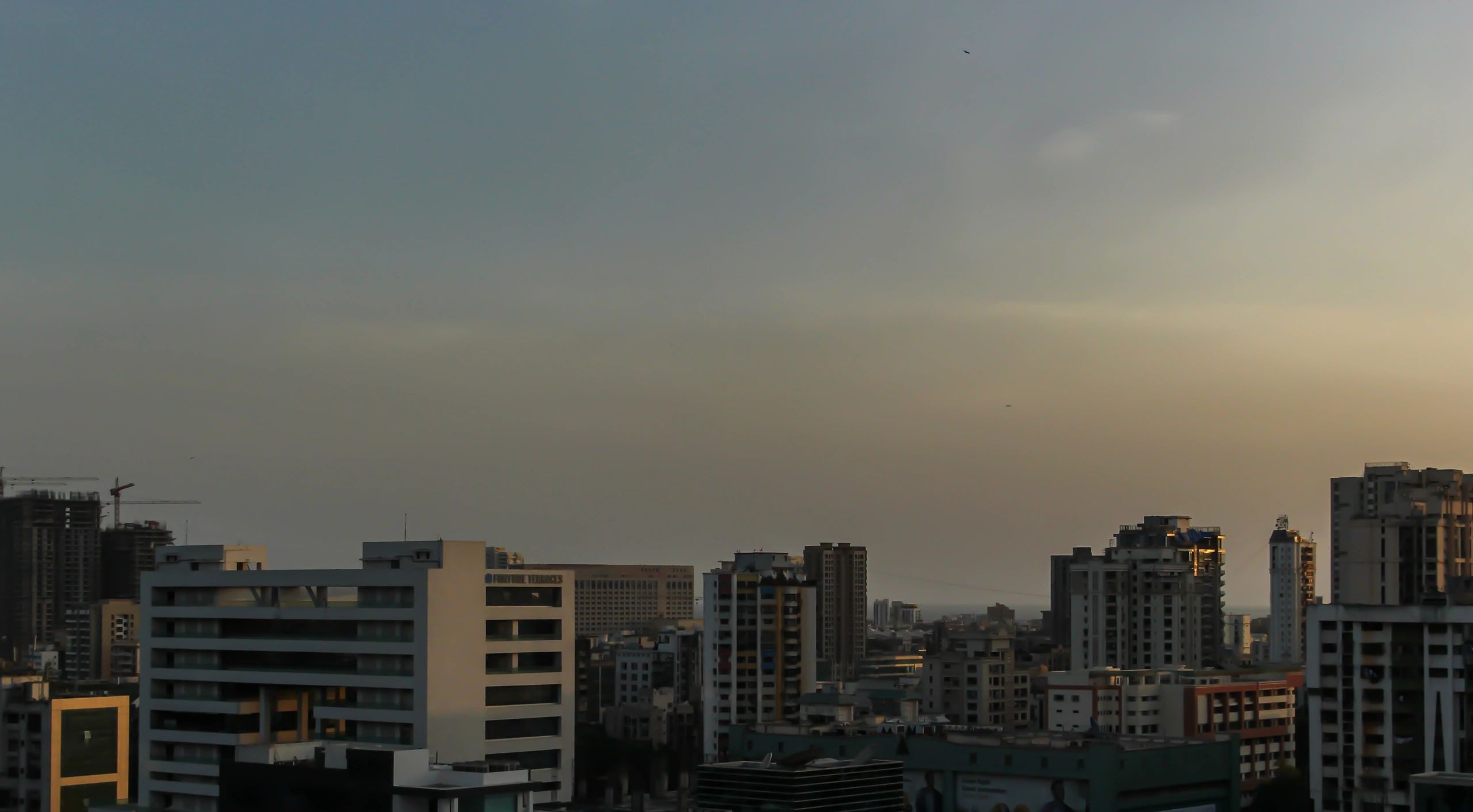 Modern city buildings representing Bhiwadi property market